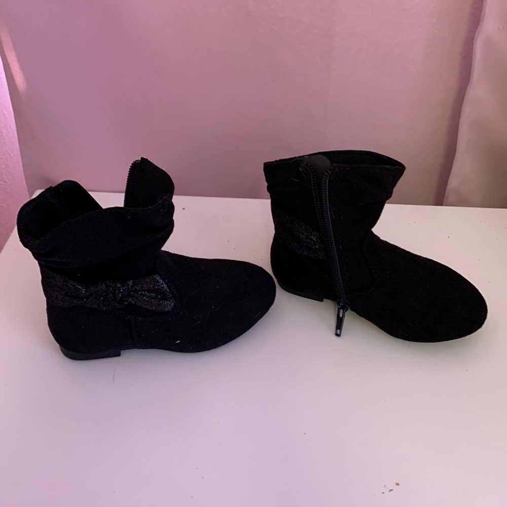 Black boots that my daughter couldn’t wear. I got them and they didn’t fit.